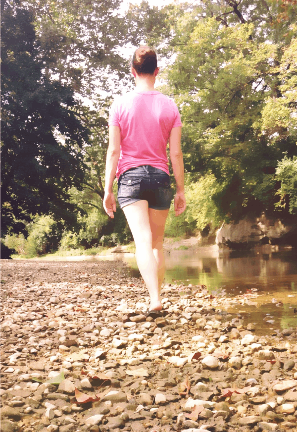 Photo of Shawna Brown traveling by a river