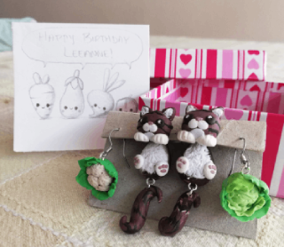 hanging kitty earings and veggie earings in FIMO clay