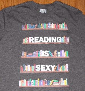 tshirt screenprinted by hand of bookshelves with words between books - reading is sexy